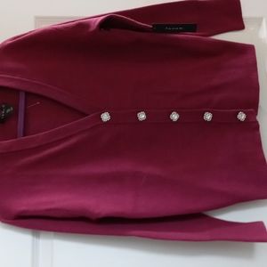 Cardigan sweater 5 rhinestone buttons marked s but I would say s/m